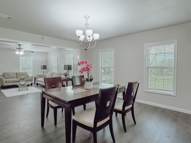 1605 N Beaton St, Corsicana, TX 75110 - dining space featuring a chandelier, wood finished floors, and ceiling fan