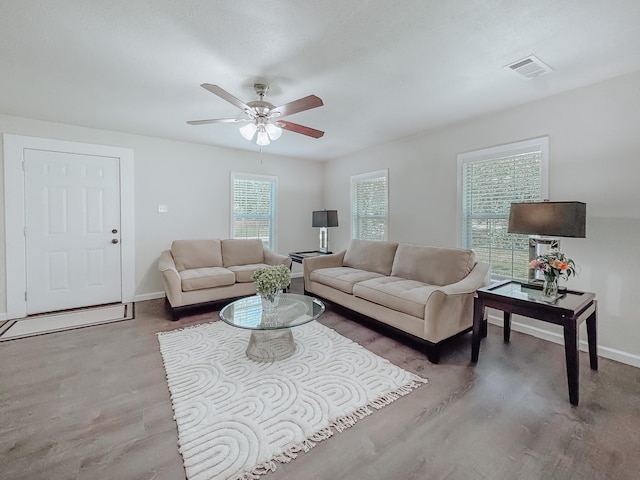 1605 N Beaton St, Corsicana, TX 75110 - living room with wood finished floors and a ceiling fan