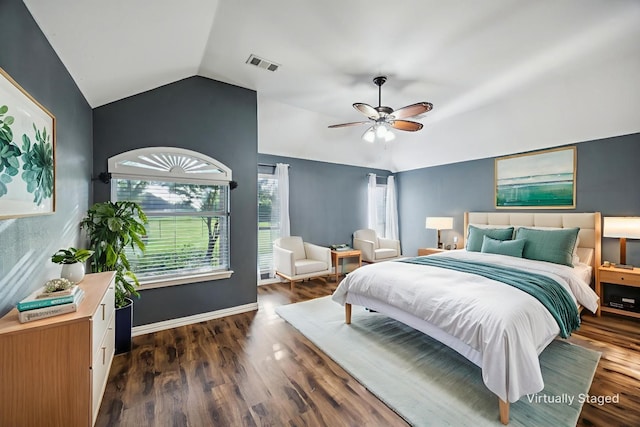 700 Lake Vista Ln, Lavon, TX 75166 - bedroom with lofted ceiling, multiple windows, dark wood-style floors, and a ceiling fan