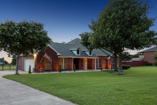 700 Lake Vista Ln, Lavon, TX 75166 - view of front of house featuring brick siding, a garage, roof with shingles, and concrete driveway