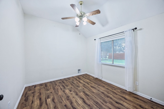 700 Lake Vista Ln, Lavon, TX 75166 - spare room with dark wood-style flooring, lofted ceiling, and a ceiling fan