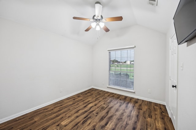 700 Lake Vista Ln, Lavon, TX 75166 - spare room featuring lofted ceiling, dark wood-style floors, and a ceiling fan