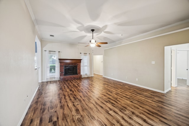 700 Lake Vista Ln, Lavon, TX 75166 - unfurnished living room featuring ornamental molding, a ceiling fan, wood finished floors, and a fireplace