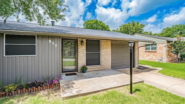 217 Wintercrest Rd, Burleson, TX 76028 - view of exterior entry with brick siding, concrete driveway, board and batten siding, and an attached garage