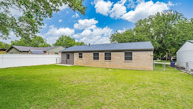 217 Wintercrest Rd, Burleson, TX 76028 - back of house with a fenced backyard and brick siding