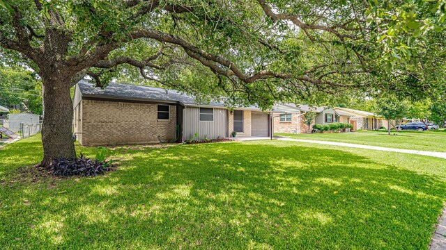 217 Wintercrest Rd, Burleson, TX 76028 - ranch-style house with a garage, a front yard, and brick siding