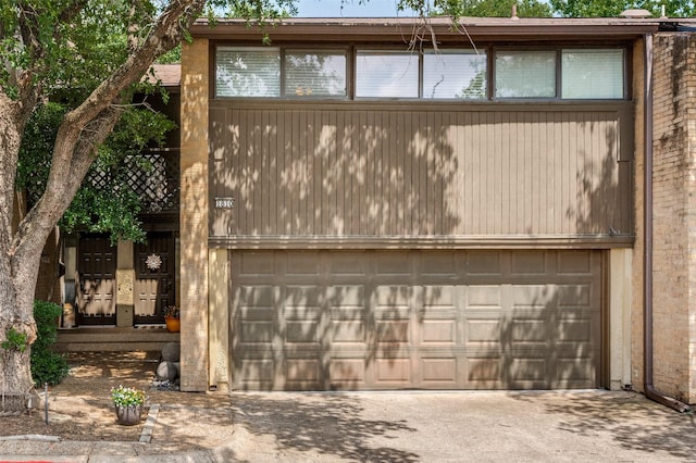 1810 Socorro Ln, Irving, TX 75061 - view of front of house with driveway and a garage