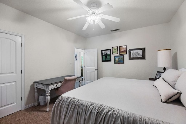 2110 Park Rdg, Denison, TX 75020 - bedroom featuring dark carpet and ceiling fan