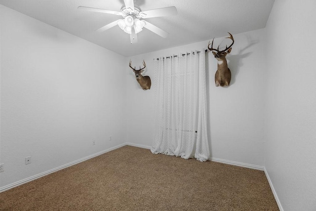 2110 Park Rdg, Denison, TX 75020 - spare room featuring carpet floors and ceiling fan