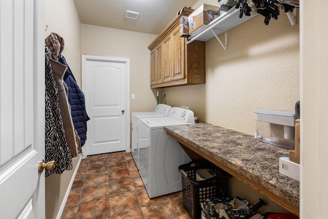 2110 Park Rdg, Denison, TX 75020 - laundry room featuring separate washer and dryer and cabinet space