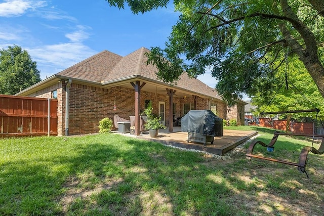 2110 Park Rdg, Denison, TX 75020 - rear view of property with brick siding, a shingled roof, and a deck