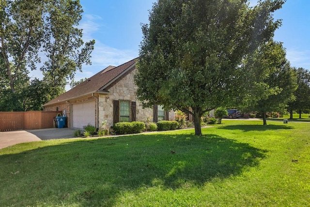 2110 Park Rdg, Denison, TX 75020 - view of property hidden behind natural elements featuring stone siding, a garage, and driveway