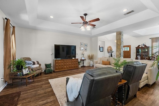 2110 Park Rdg, Denison, TX 75020 - living room with a tray ceiling, a skylight, a ceiling fan, dark wood-style flooring, and recessed lighting
