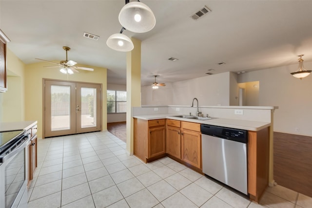 4305 Sonoma Dr, Denton, TX 76226 - kitchen featuring stainless steel appliances, ceiling fan, french doors, and light countertops
