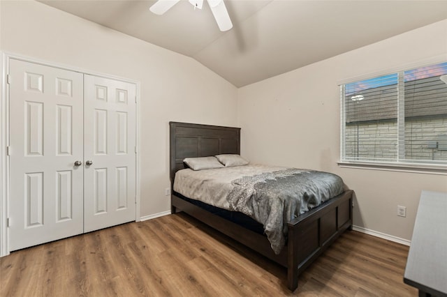 6625 Vista View Dr, Woodway, TX 76712 - bedroom featuring lofted ceiling, wood finished floors, a ceiling fan, and a closet