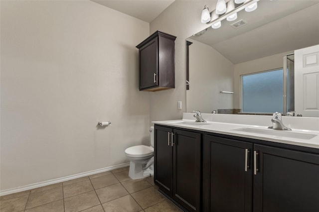 6625 Vista View Dr, Woodway, TX 76712 - bathroom featuring double vanity, tile patterned floors, and vaulted ceiling