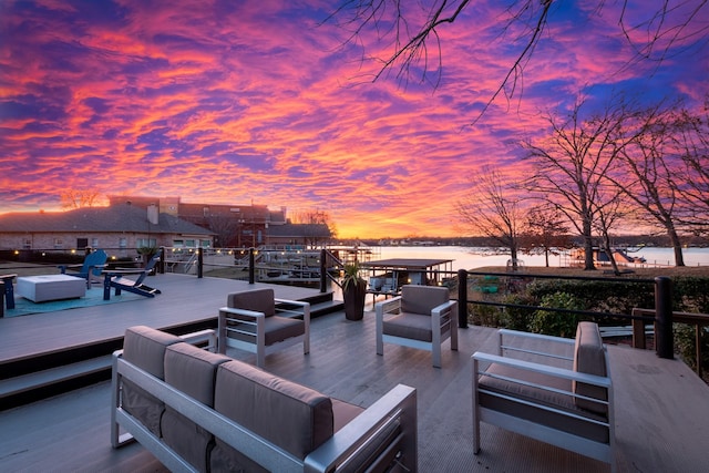 111 Hickory Creek Cir, Gun Barrel City, TX 75156 - deck at dusk featuring an outdoor living space and a water view
