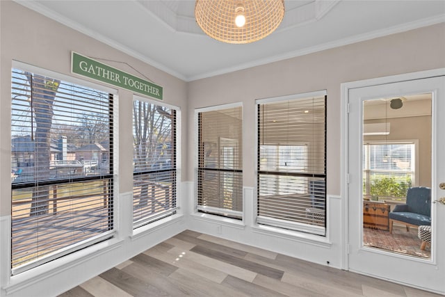 111 Hickory Creek Cir, Gun Barrel City, TX 75156 - unfurnished sunroom with wood finished floors and crown molding
