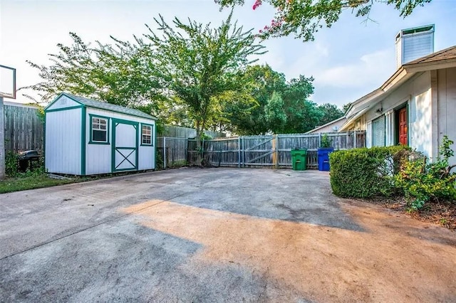 403 Gingerbread Ln, Waxahachie, TX 75165 - view of patio / terrace with a storage unit