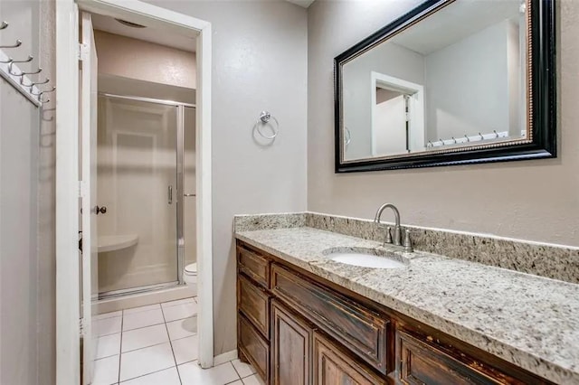 403 Gingerbread Ln, Waxahachie, TX 75165 - bathroom featuring a shower stall, vanity, and tile patterned flooring