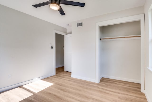 118 W Wanda Dr, Garland, TX 75040 - unfurnished bedroom featuring light wood-style floors, a closet, and a ceiling fan