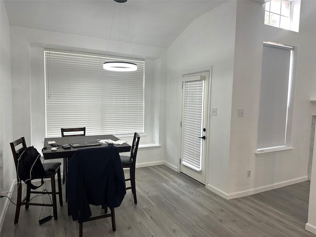 4201 Iron Ln, Mansfield, TX 76063 - dining area with vaulted ceiling and wood finished floors