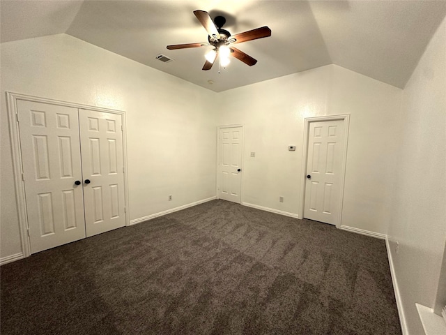 4201 Iron Ln, Mansfield, TX 76063 - unfurnished bedroom featuring lofted ceiling, dark carpet, and a ceiling fan