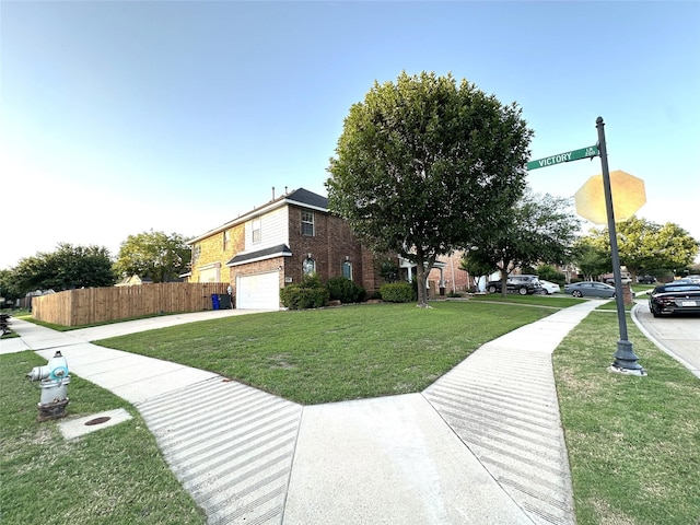 4201 Iron Ln, Mansfield, TX 76063 - view of side of home with a garage, brick siding, and concrete driveway