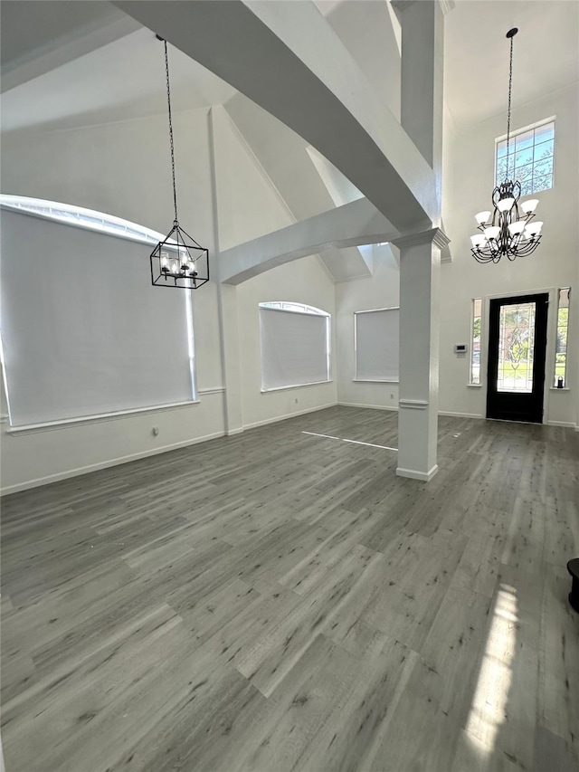 4201 Iron Ln, Mansfield, TX 76063 - entryway with a chandelier, high vaulted ceiling, and wood finished floors