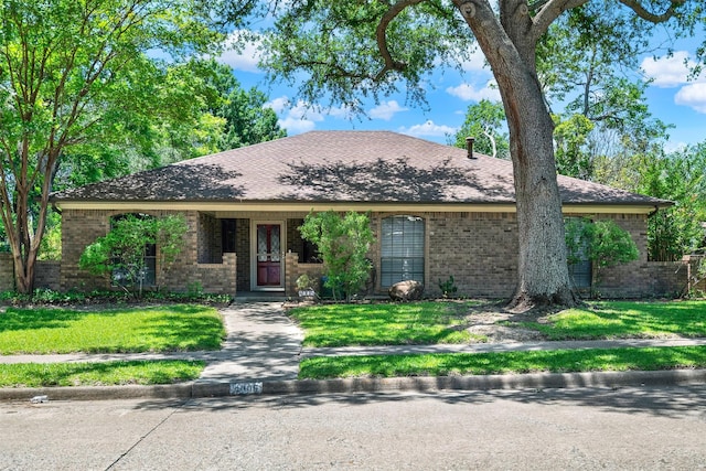 4005 Azalea Ln, Garland, TX 75043 - single story home featuring brick siding and a front yard