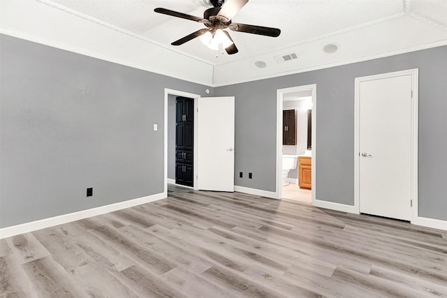 4005 Azalea Ln, Garland, TX 75043 - unfurnished bedroom with light wood finished floors, ensuite bath, and a ceiling fan