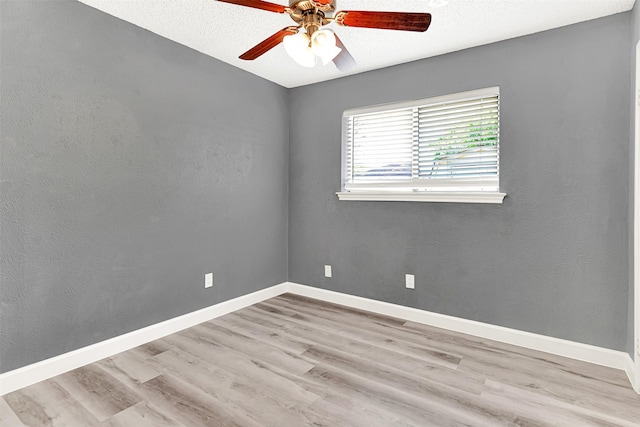 4005 Azalea Ln, Garland, TX 75043 - spare room featuring wood finished floors and a ceiling fan