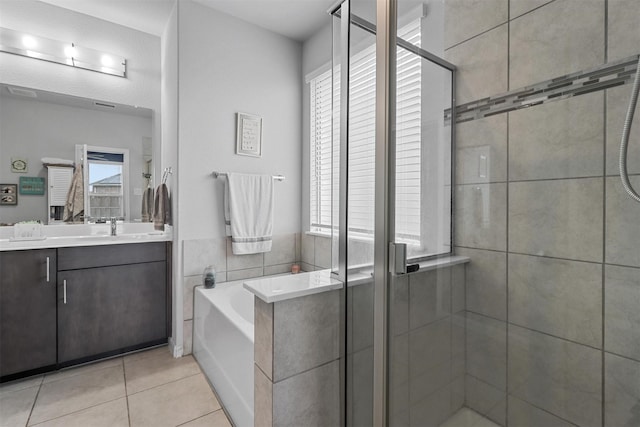 1154 Holcombe Dr, Anna, TX 75409 - full bathroom with vanity, a garden tub, a shower stall, and healthy amount of natural light