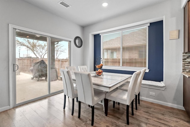 1154 Holcombe Dr, Anna, TX 75409 - dining area with light wood finished floors and recessed lighting