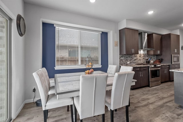 1154 Holcombe Dr, Anna, TX 75409 - dining area featuring healthy amount of natural light, light wood-type flooring, and recessed lighting