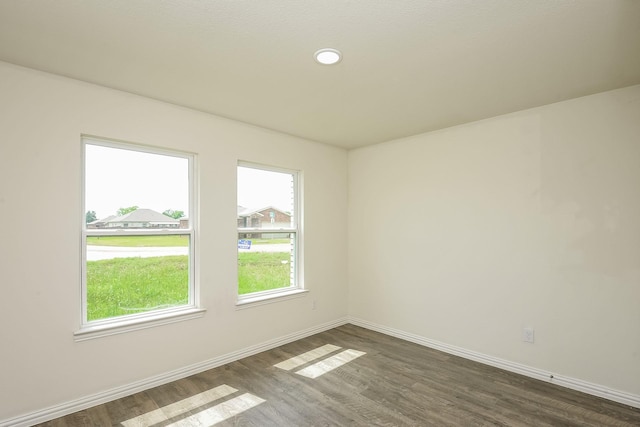 2719 William St, Mabank, TX 75147 - unfurnished room with dark wood finished floors and recessed lighting