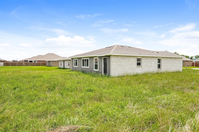2719 William St, Mabank, TX 75147 - back of house featuring brick siding
