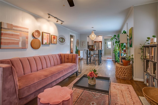 1211 Lansford Ave, Dallas, TX 75224 - living room with ornamental molding, wood finished floors, and ceiling fan