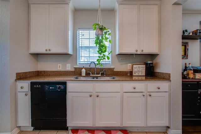 1211 Lansford Ave, Dallas, TX 75224 - kitchen with black dishwasher, white cabinetry, and dark stone countertops