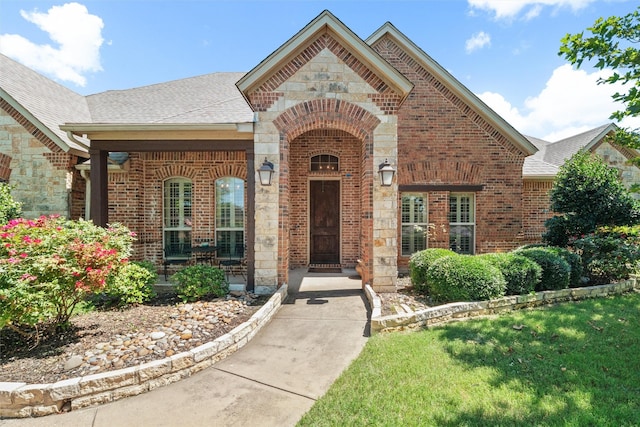 5820 Shiloh Forest Dr, Midlothian, TX 76065 - view of front of house featuring roof with shingles, brick siding, and stone siding