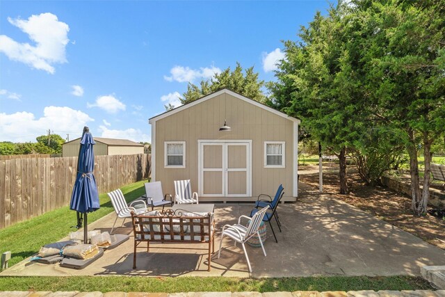 5820 Shiloh Forest Dr, Midlothian, TX 76065 - view of patio featuring a storage shed