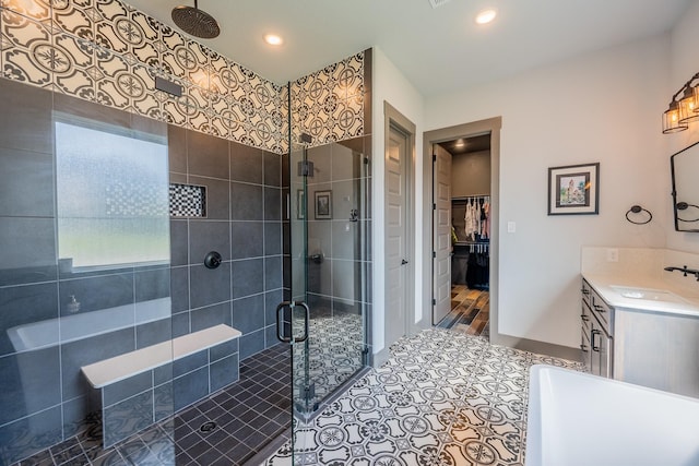 9901 Mi Tierra Dr, Fort Worth, TX 76179 - full bath with a stall shower, vanity, a soaking tub, a walk in closet, and recessed lighting