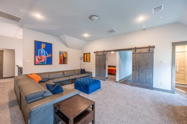 9901 Mi Tierra Dr, Fort Worth, TX 76179 - carpeted living room with lofted ceiling, a barn door, and recessed lighting