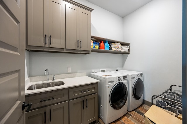 9901 Mi Tierra Dr, Fort Worth, TX 76179 - washroom with cabinet space, wood finished floors, and independent washer and dryer