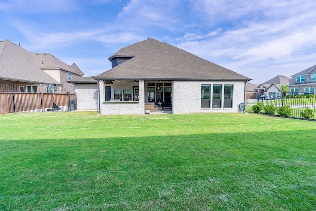 9901 Mi Tierra Dr, Fort Worth, TX 76179 - rear view of property with a fenced backyard, brick siding, roof with shingles, and a patio