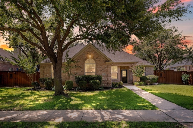 1617 Shadywood Ln, Flower Mound, TX 75028 - view of front of property featuring brick siding, roof with shingles, and a gate