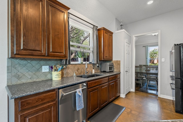 1617 Shadywood Ln, Flower Mound, TX 75028 - kitchen featuring dishwasher, backsplash, and plenty of natural light