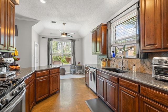 1617 Shadywood Ln, Flower Mound, TX 75028 - kitchen with stainless steel appliances, backsplash, a ceiling fan, concrete flooring, and a textured ceiling
