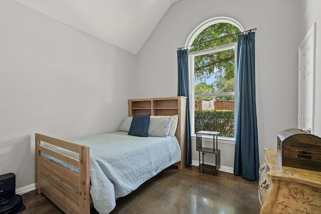 1617 Shadywood Ln, Flower Mound, TX 75028 - bedroom with multiple windows, vaulted ceiling, and finished concrete floors