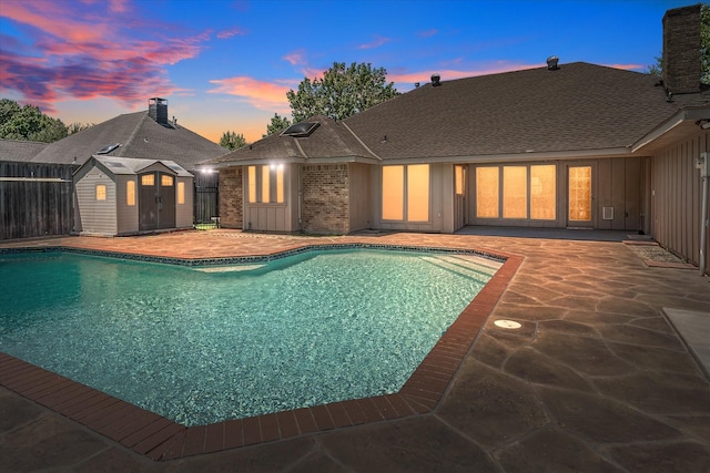 4120 Merriman Dr, Plano, TX 75074 - outdoor pool featuring a patio and a storage shed